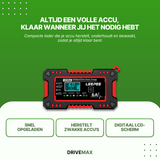 Battery charger connected to car battery in open engine compartment