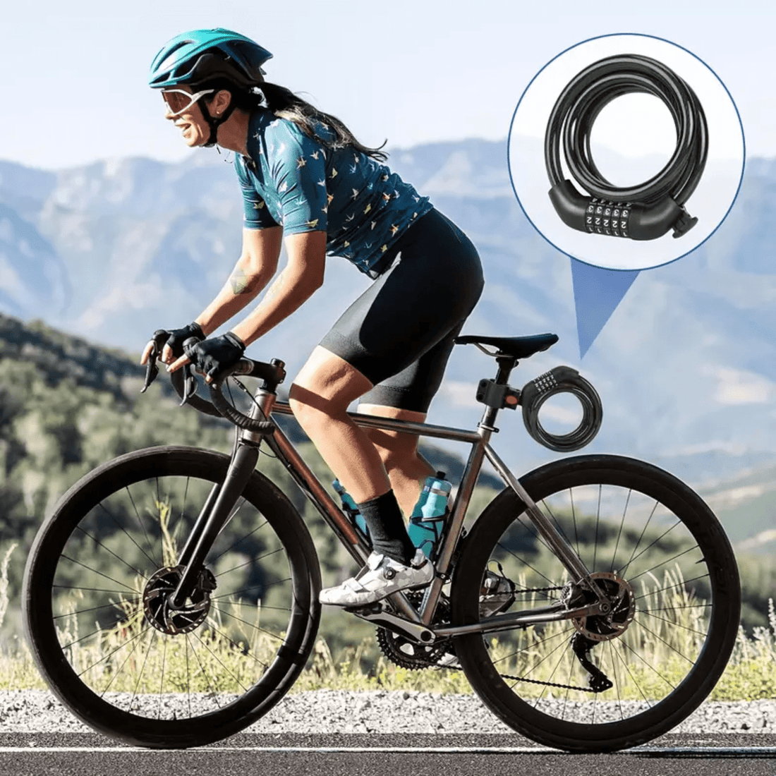 Black LockMaster cable lock with combination code mounted on a racing bike while cycling in the mountains.