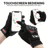Black MotoGrip motorcycle gloves with red accents used for operating a smartphone with a touchscreen.