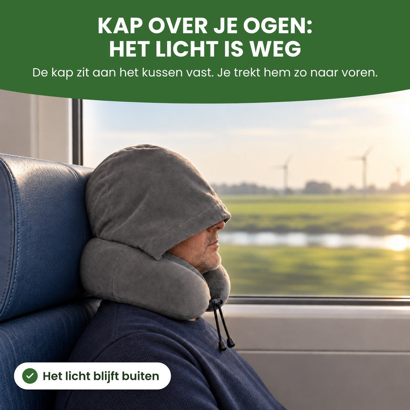 Man on a train with the hood of the gray NeckEase travel pillow pulled down over his eyes, sun coming in: hood over your eyes, lights out