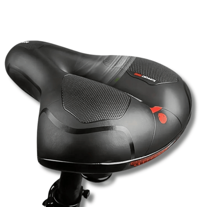 Zwart ergonomisch fietszadel met antislip zones en ingebouwd rood achterlicht, ideaal voor lange ritten.