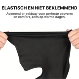 Black ThermoShield™ balaclava is stretched between two hands, showing stretchy and breathable fabric.