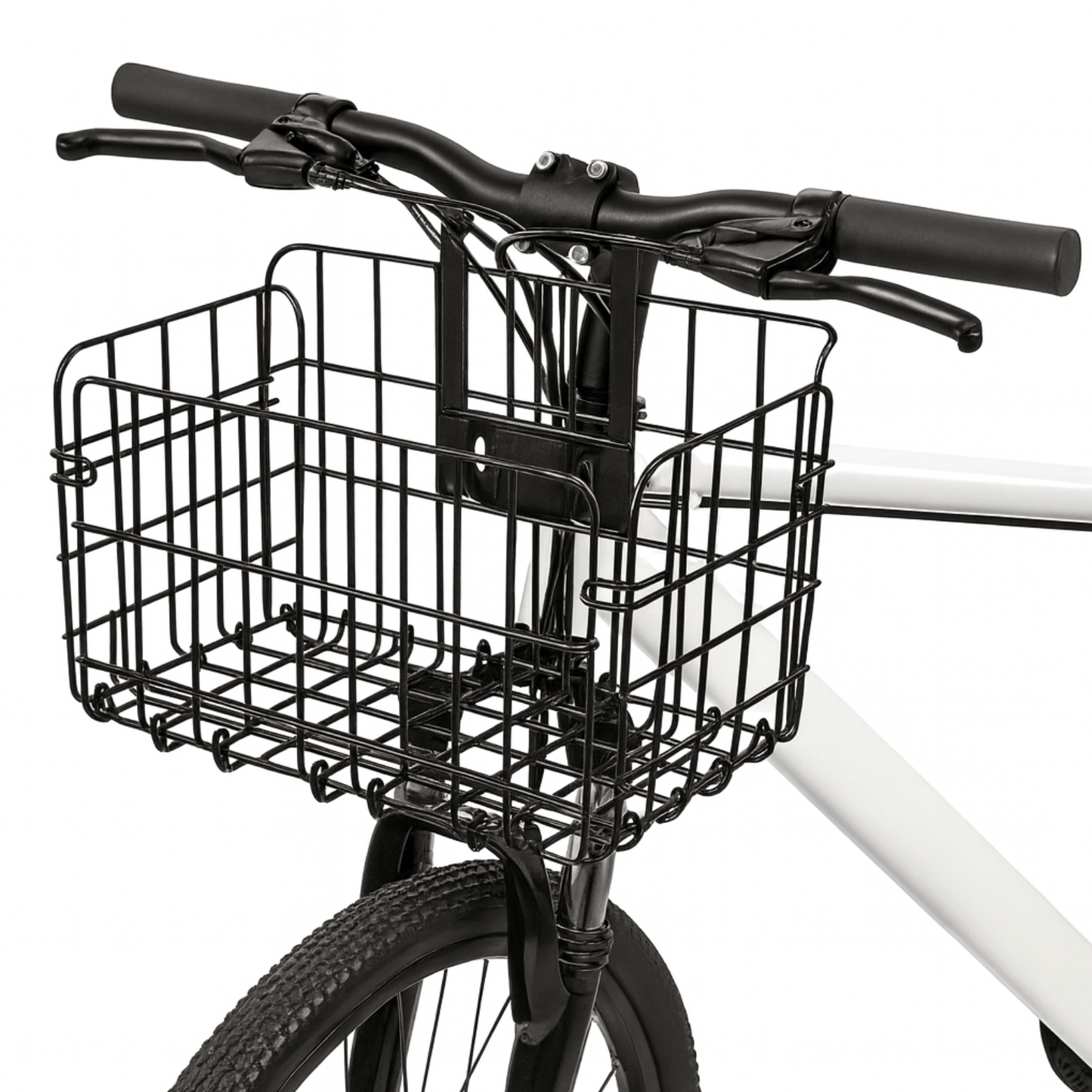 Zwarte opvouwbare metalen fietsmand van Trego bevestigd aan het stuur van een fiets, vooraanzicht.