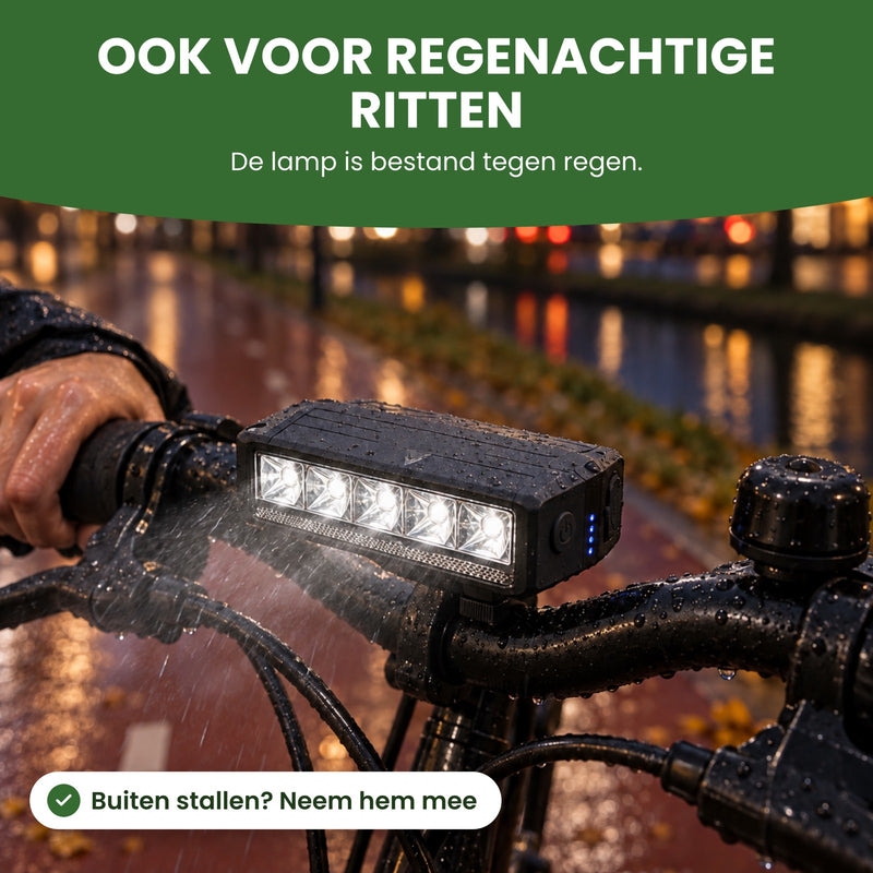 Voltura bike light mounted on the handlebar, shining in the rain: the light is rain-resistant